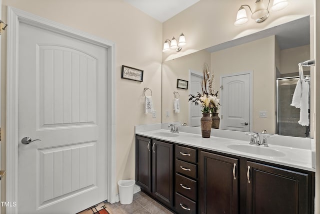 4612 Hanging Fern Ln, Raleigh, NC 27604 - full bath featuring double vanity, a shower with shower door, and tile patterned flooring