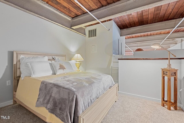 bedroom featuring carpet flooring, wood ceiling, and baseboards