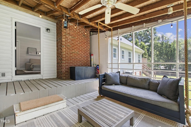 5413 Lower Creek Ct, Apex, NC 27539 - sunroom / solarium with outdoor lounge area, a ceiling fan, plenty of natural light, and beam ceiling