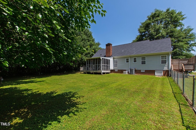 5413 Lower Creek Ct, Apex, NC 27539 - rear view of house with a sunroom, a chimney, central air condition unit, and crawl space