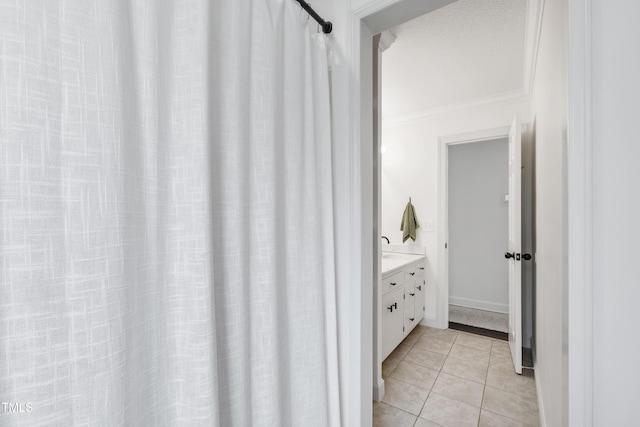 5413 Lower Creek Ct, Apex, NC 27539 - bathroom featuring ornamental molding, vanity, and tile patterned flooring