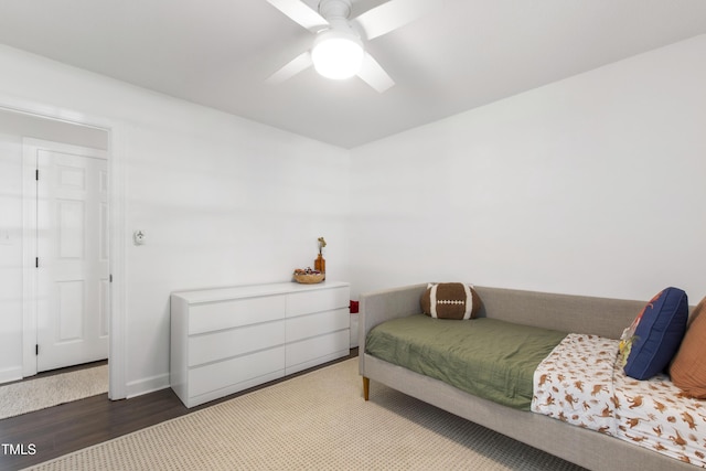 5413 Lower Creek Ct, Apex, NC 27539 - bedroom with wood finished floors, ceiling fan, and baseboards