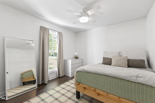 5413 Lower Creek Ct, Apex, NC 27539 - bedroom featuring wood finished floors and a ceiling fan