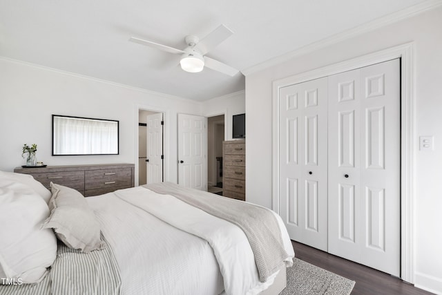 5413 Lower Creek Ct, Apex, NC 27539 - bedroom with dark wood-style flooring, ornamental molding, a closet, and a ceiling fan