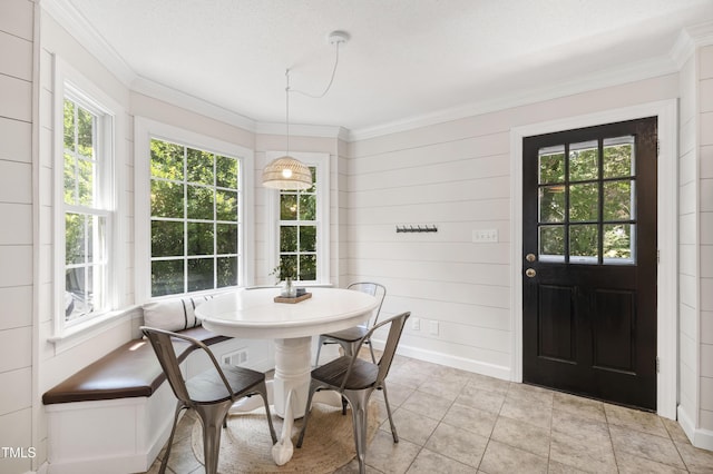 5413 Lower Creek Ct, Apex, NC 27539 - dining space with crown molding and light tile patterned floors
