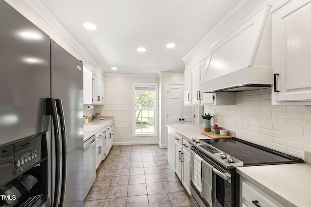 5413 Lower Creek Ct, Apex, NC 27539 - kitchen with stainless steel appliances, custom range hood, light countertops, decorative backsplash, and ornamental molding
