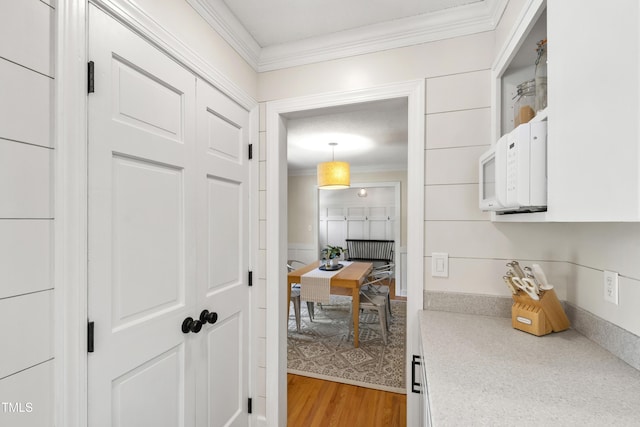 5413 Lower Creek Ct, Apex, NC 27539 - hall featuring crown molding and light wood-style floors