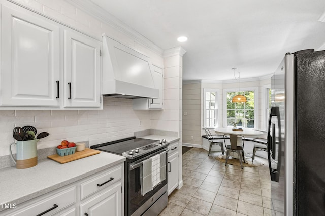 5413 Lower Creek Ct, Apex, NC 27539 - kitchen with stainless steel appliances, ornamental molding, custom range hood, white cabinets, and tasteful backsplash