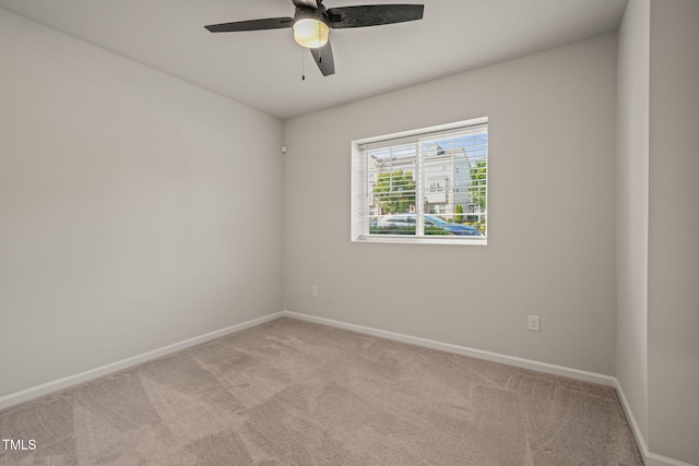 6618 Perry Creek Rd, Raleigh, NC 27616 - unfurnished room with baseboards, light carpet, and a ceiling fan