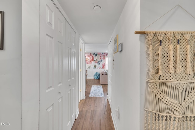corridor with wood finished floors