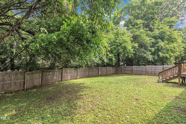 view of yard featuring stairs