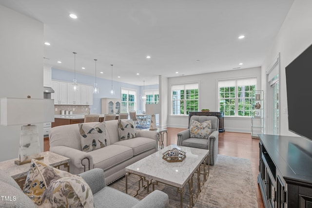 2511 Range Overlook Xing, Apex, NC 27523 - living area with recessed lighting and light wood-type flooring