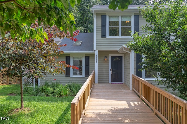 2222 Pathway Dr, Chapel Hill, NC 27516 - view of front of home with a shingled roof and a front lawn