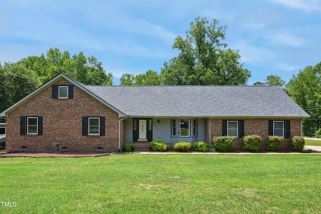 8509 Ashwood Dr, Raleigh, NC 27603 - ranch-style home with brick siding, a front lawn, a shingled roof, and crawl space