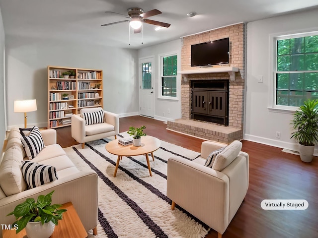 1104 Theresa Ct, Raleigh, NC 27615 - living room featuring wood finished floors, baseboards, and ceiling fan