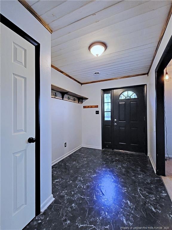 6261 Stoney Point Loop, Fayetteville, NC 28306 - foyer entrance with crown molding, wood ceiling, and baseboards