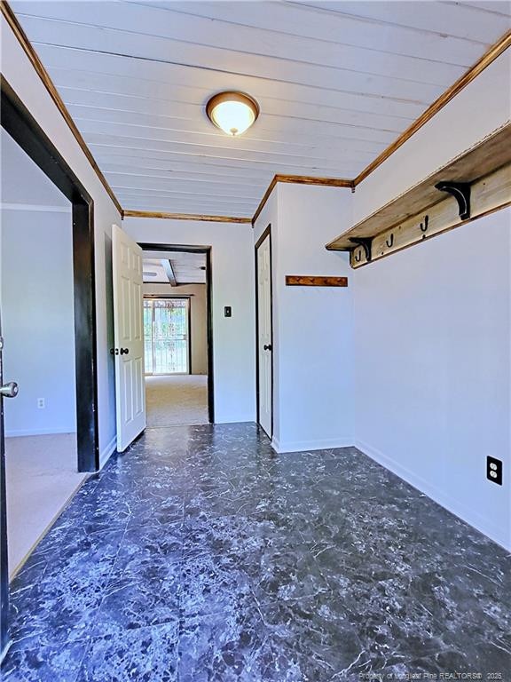 6261 Stoney Point Loop, Fayetteville, NC 28306 - corridor with crown molding, baseboards, and wooden ceiling
