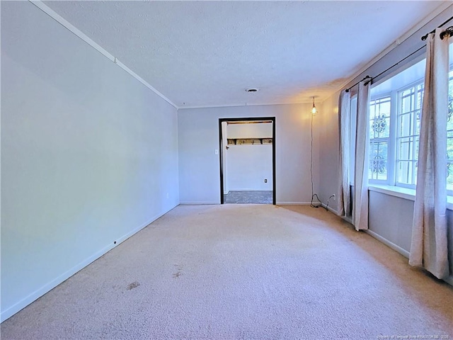 6261 Stoney Point Loop, Fayetteville, NC 28306 - carpeted spare room with a textured ceiling and baseboards