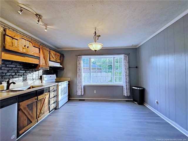 6261 Stoney Point Loop, Fayetteville, NC 28306 - kitchen featuring white range with electric cooktop, a sink, wood finished floors, under cabinet range hood, and brown cabinets