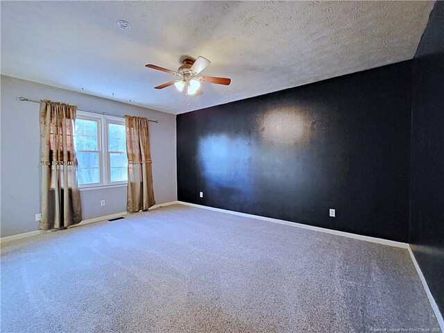 6261 Stoney Point Loop, Fayetteville, NC 28306 - carpeted spare room with a ceiling fan and baseboards