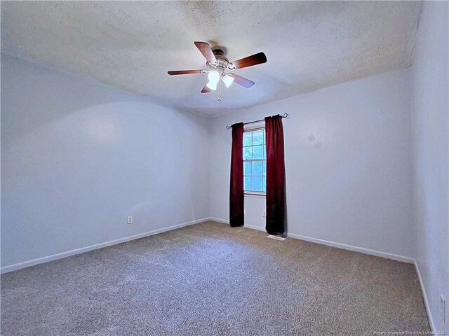 6261 Stoney Point Loop, Fayetteville, NC 28306 - carpeted empty room featuring a textured ceiling, a ceiling fan, and baseboards