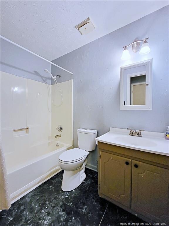 6261 Stoney Point Loop, Fayetteville, NC 28306 - full bath featuring toilet, vanity, and  shower combination