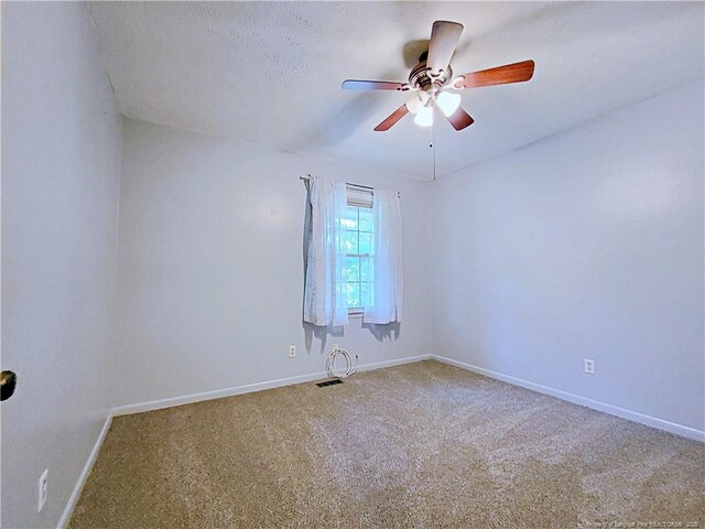 6261 Stoney Point Loop, Fayetteville, NC 28306 - carpeted spare room featuring a ceiling fan and baseboards