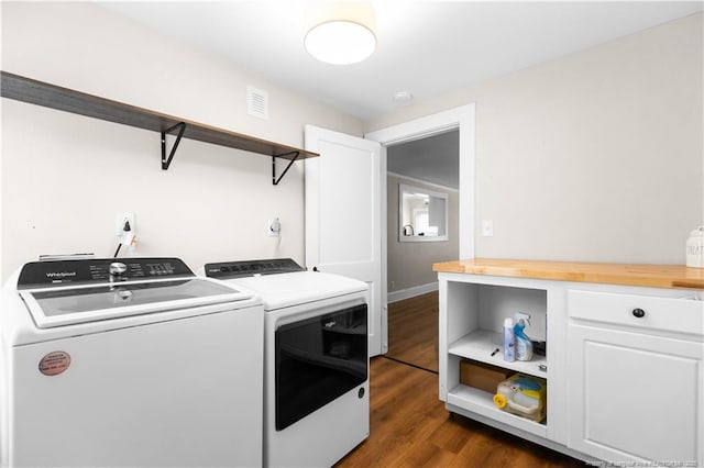 1001 N Orange Ave, Dunn, NC 28334 - washroom featuring independent washer and dryer, dark wood-style flooring, and baseboards