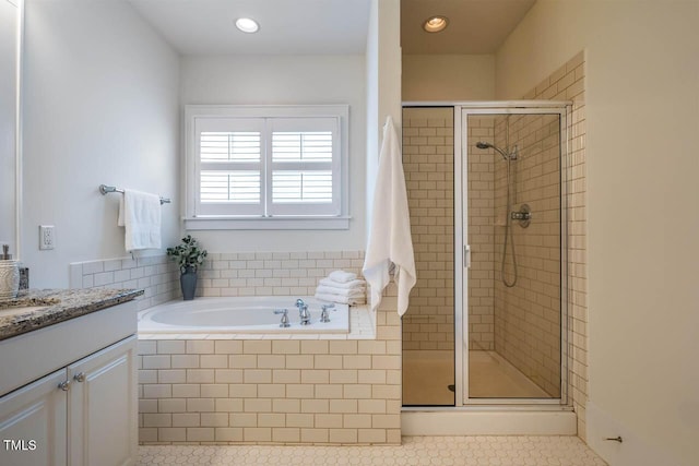 253 Tobacco Farm Way, Chapel Hill, NC 27516 - bathroom featuring a garden tub, a stall shower, vanity, tile patterned floors, and recessed lighting