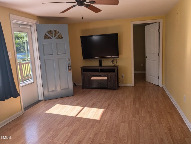 3405 Ode Turner Rd, Hillsborough, NC 27278 - living room featuring light wood finished floors, ceiling fan, and baseboards