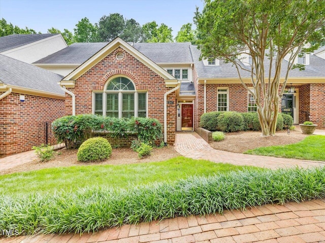 3347 Ridgecrest Ct, Raleigh, NC 27607 - view of front of house with brick siding and a shingled roof