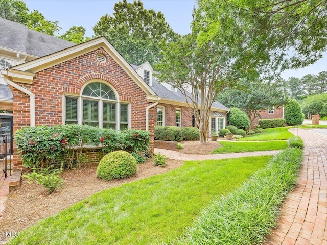 3347 Ridgecrest Ct, Raleigh, NC 27607 - view of front facade with brick siding and a front yard