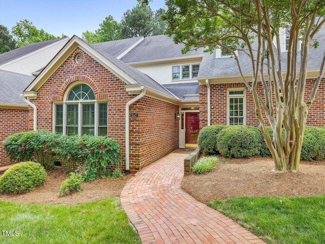 3347 Ridgecrest Ct, Raleigh, NC 27607 - view of front of house with brick siding and a shingled roof