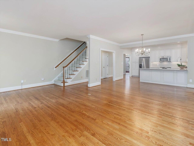 3347 Ridgecrest Ct, Raleigh, NC 27607 - unfurnished living room featuring a chandelier, light wood finished floors, stairs, baseboards, and ornamental molding