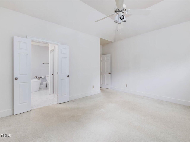 3347 Ridgecrest Ct, Raleigh, NC 27607 - unfurnished bedroom with baseboards, ensuite bathroom, carpet, a ceiling fan, and lofted ceiling