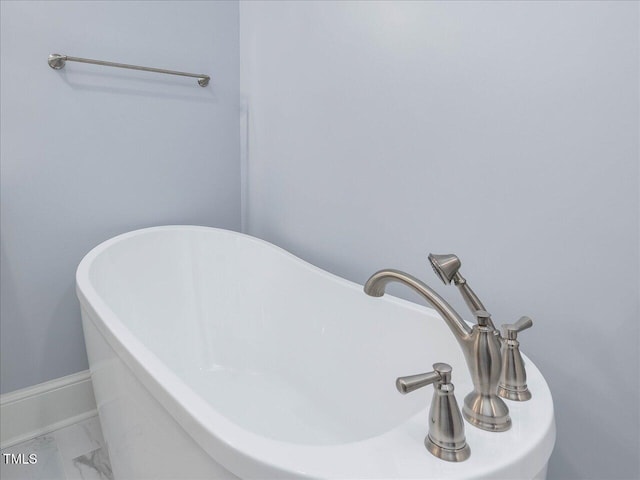 3347 Ridgecrest Ct, Raleigh, NC 27607 - bathroom with a freestanding tub and marble finish floors