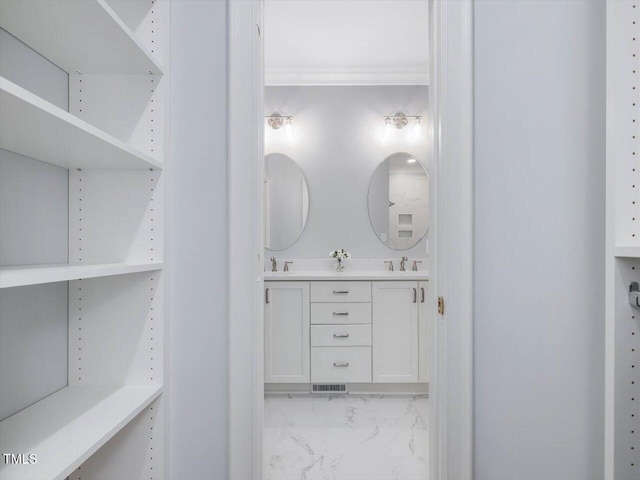 3347 Ridgecrest Ct, Raleigh, NC 27607 - bathroom featuring double vanity, ornamental molding, and marble finish flooring