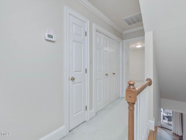 3347 Ridgecrest Ct, Raleigh, NC 27607 - hallway with an upstairs landing, ornamental molding, and baseboards