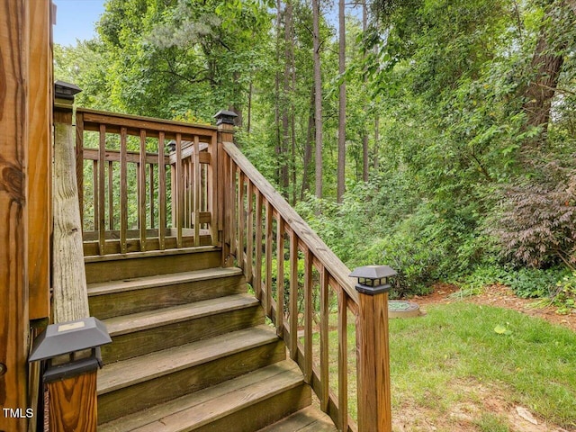 3347 Ridgecrest Ct, Raleigh, NC 27607 - wooden deck with stairway and a wooded view