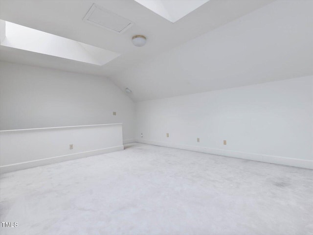 3347 Ridgecrest Ct, Raleigh, NC 27607 - additional living space featuring vaulted ceiling, baseboards, and light carpet