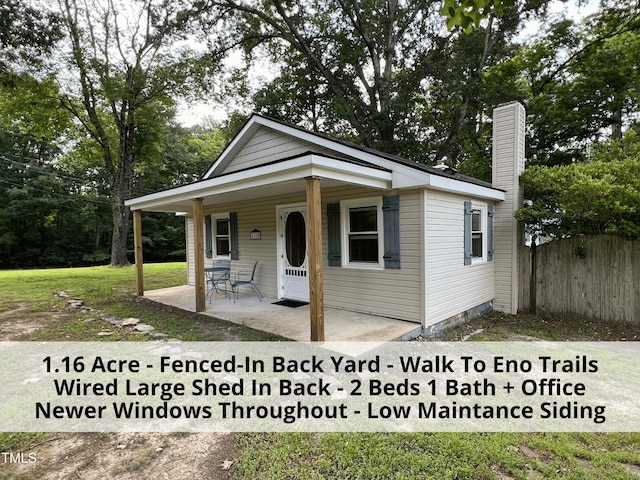 4720 Rivermont Rd, Durham, NC 27712 - bungalow featuring covered porch and a chimney
