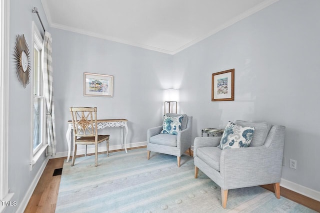 19 Knightsbridge Ct, Durham, NC 27707 - sitting room featuring ornamental molding, light wood-type flooring, and baseboards