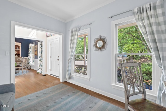 19 Knightsbridge Ct, Durham, NC 27707 - entrance foyer with wood finished floors, plenty of natural light, baseboards, and ornamental molding