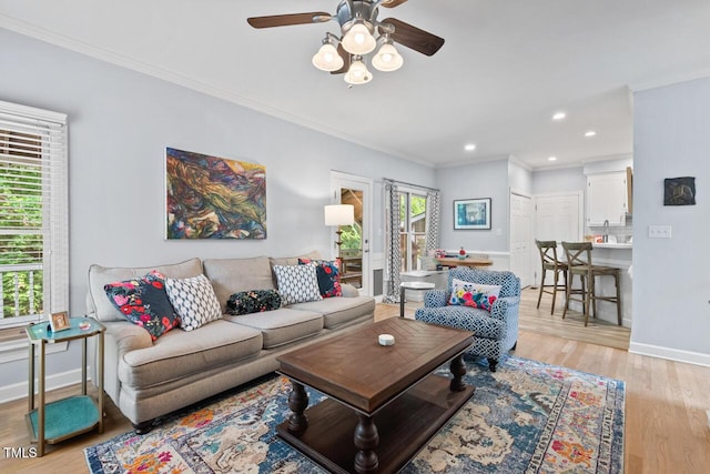 19 Knightsbridge Ct, Durham, NC 27707 - living room with ceiling fan, baseboards, crown molding, light wood-type flooring, and recessed lighting
