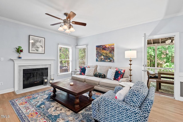 19 Knightsbridge Ct, Durham, NC 27707 - living room with ceiling fan, ornamental molding, light wood finished floors, a high end fireplace, and baseboards