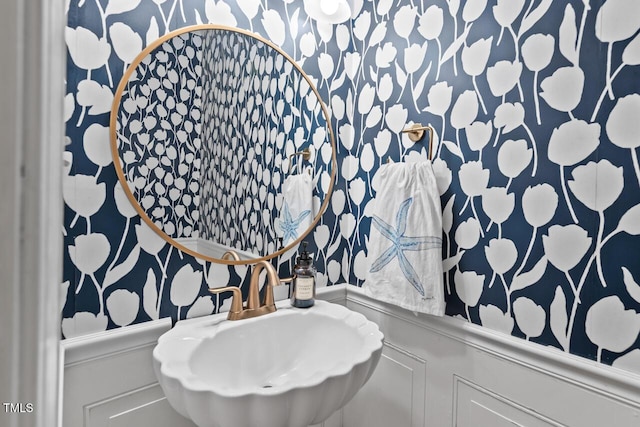19 Knightsbridge Ct, Durham, NC 27707 - bathroom featuring wallpapered walls, a wainscoted wall, a sink, and a decorative wall