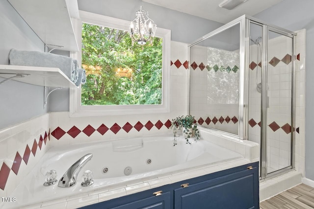 19 Knightsbridge Ct, Durham, NC 27707 - full bathroom with a shower stall, a tub with jets, a chandelier, and wood finished floors