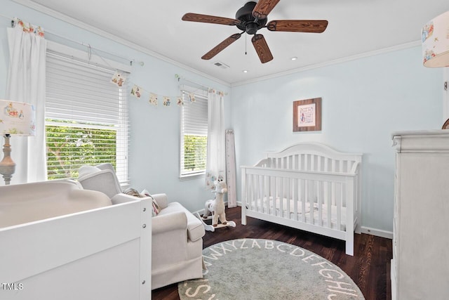 19 Knightsbridge Ct, Durham, NC 27707 - bedroom featuring crown molding, a crib, wood finished floors, a ceiling fan, and baseboards