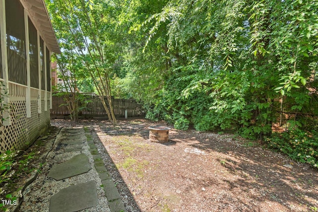 19 Knightsbridge Ct, Durham, NC 27707 - view of yard featuring an outdoor fire pit
