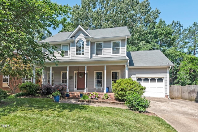 19 Knightsbridge Ct, Durham, NC 27707 - colonial inspired home with an attached garage, driveway, and covered porch